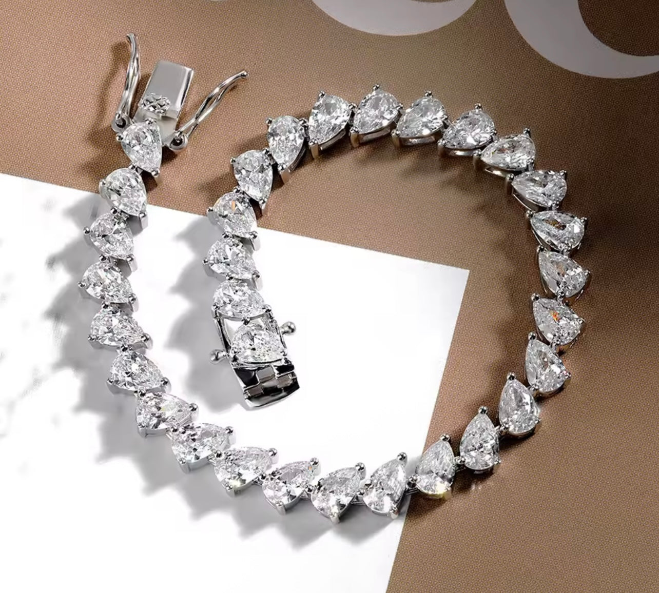 Iced Out Angled Pear Diamond Bracelet By Diamond District Cartel