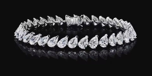 Iced Out Angled Pear Diamond Bracelet By Diamond District Cartel